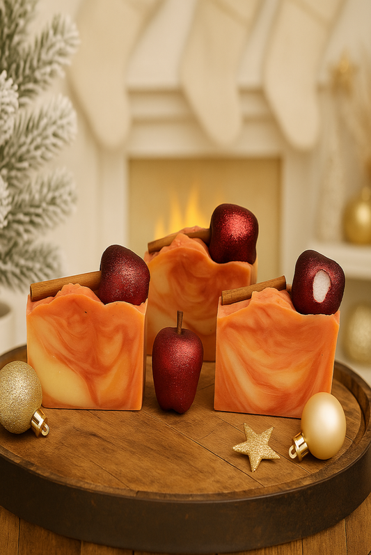 soap with apples on top sitting on a table in front of a fire place